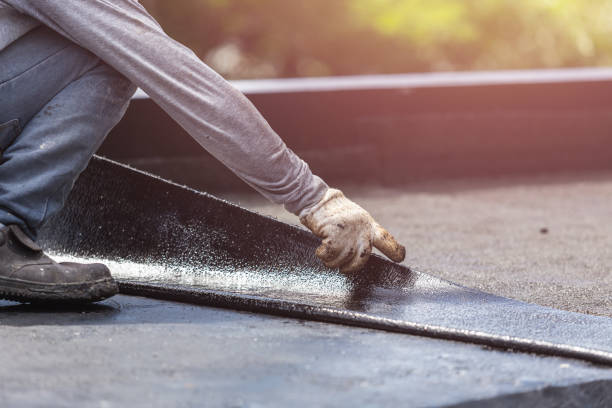 Professional Basement Waterproofing technician working in Henderson, MI
